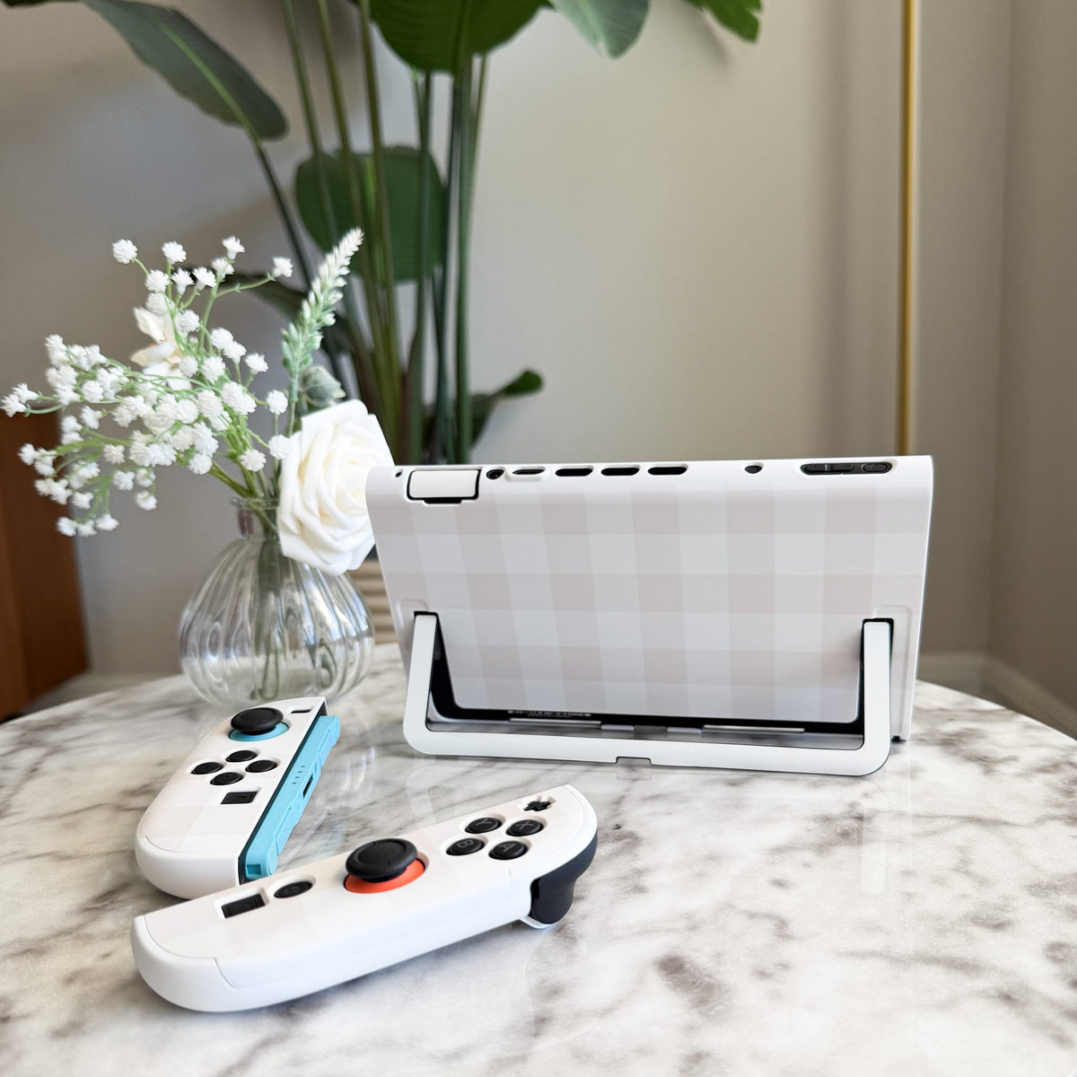 Beige Linen Switch 2 case on kickstand, back view